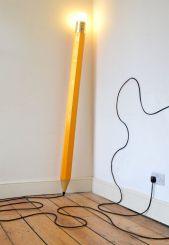 An oversize pencil lamp