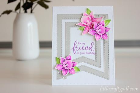 White embossed flowers colored with Zig Clean Color Brush Markers White embossed flowers colored with Zig Clean Color Brush Markers