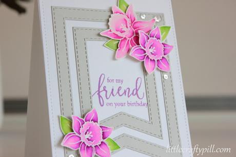 White embossed flowers colored with Zig Clean Color Brush Markers White embossed flowers colored with Zig Clean Color Brush Markers