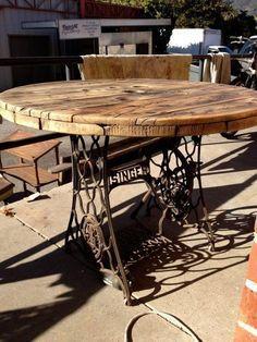 2. Table made with an old sewing machine base and a cable spool
