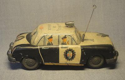 Patrullero de chapa a fricción