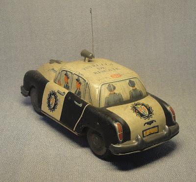 Patrullero de chapa a fricción