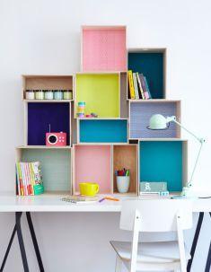 6. Unas cajas de Ikea, decoradas con papeles y colores, serán perfectas para mantener a raya tu material de scrapbook