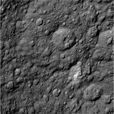 Cassini retorna impactantes imágenes del sobrevuelo de Rhea