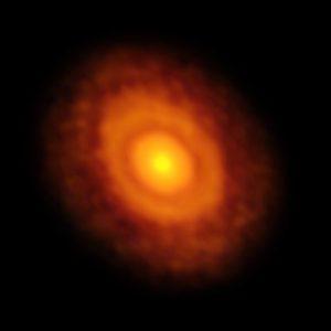 Una erupción estelar permite ver la línea de nieve en un disco protoplanetario Disco protoplanetario estrella V883 Orionis