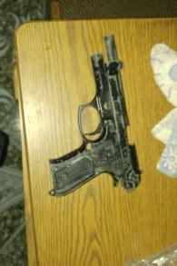 A pistol uncovered by IDF troops during a night-time raid near Hebron on August 17, 2016. (IDF Spokesperson's Unit)