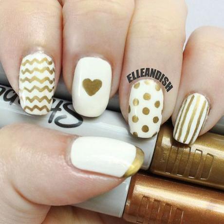 uñas doradas sharpie