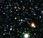 Telescopios NASA ayudan identificar cúmulo galaxias distante