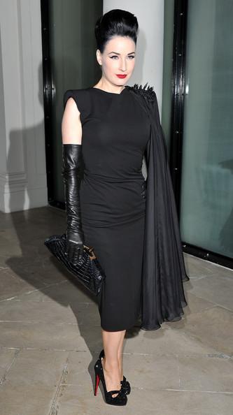 Dita Von Teese attends the Jean Paul Gaultier Ready to Wear Spring/Summer 2011 show during Paris Fashion Week on October 2, 2010 in Paris, France.