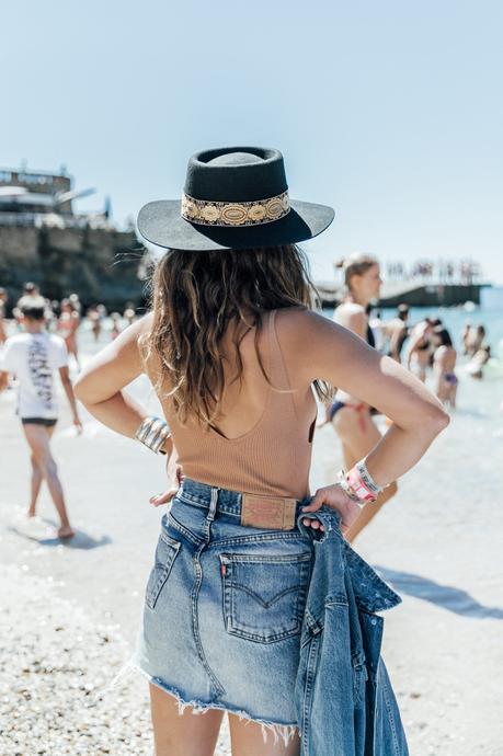 Into The Crowd Biarritz-Big_Festival-Live_in_Levis-Double_Denim-Denim_Skirt-Denim_Jacket-Nude_Top-Lack_Of_Color_Hat-Outfit-Summer-Street_Style-27