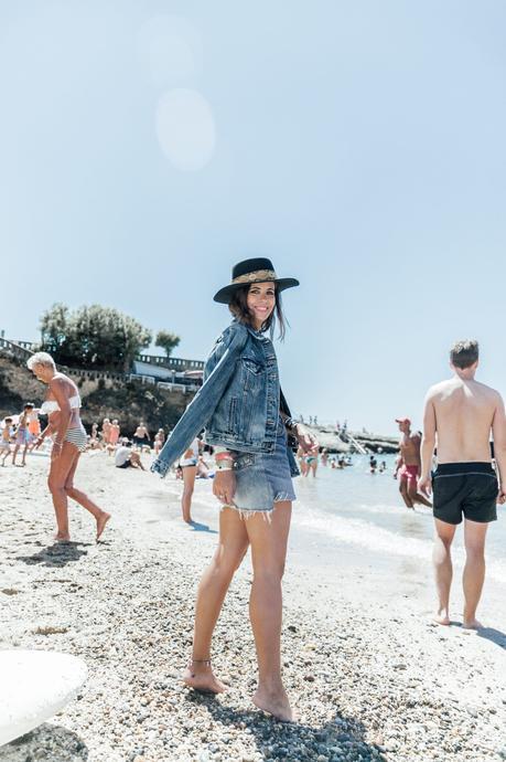 Into The Crowd Biarritz-Big_Festival-Live_in_Levis-Double_Denim-Denim_Skirt-Denim_Jacket-Nude_Top-Lack_Of_Color_Hat-Outfit-Summer-Street_Style-29