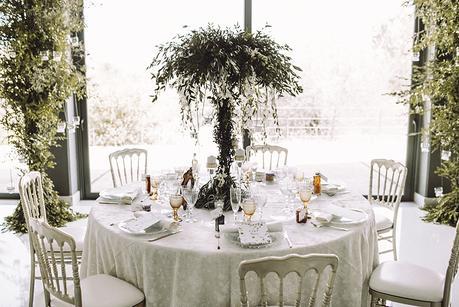 Una boda en el bosque centros de mesa altos www.bodasdecuento.com