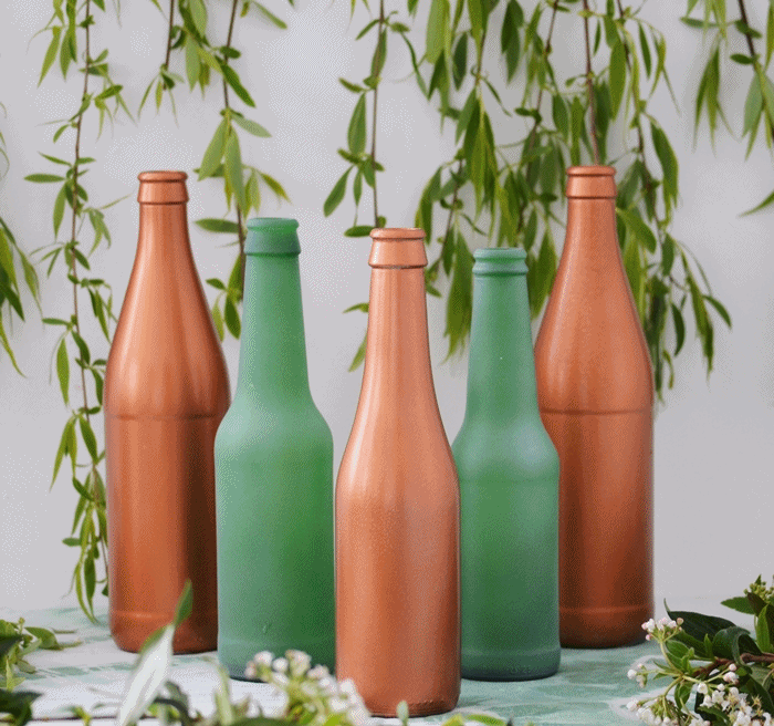 Primavera embotellada {DIY floreritos}