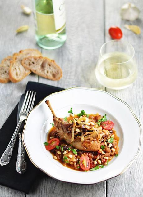 Catalan Rabbit With Onion (Conill Amb Ceba) - LexiBites.com - Rabbit braised in tomatoes and onions with pine nuts, raisins and brandy or whiskey. Gluten-free. #Catalan #Spanish: 