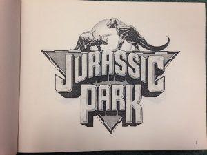 Detrás del logo de Jurassic Park