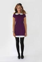 POÈTE  mirando atrás.