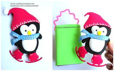 Bolsita de dulces de pingüino navideño reciclando cajas de leche