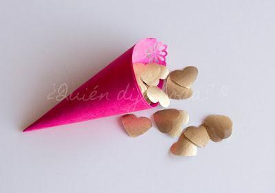 Cono de confetti en rosa y dorado