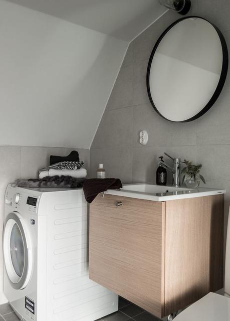 mobiliario negro marmol de carrara distribución abierta detalles en bronce decoración sofisticada elegante decoración pisos pequeños blog decoración nórdica atico nórdico 