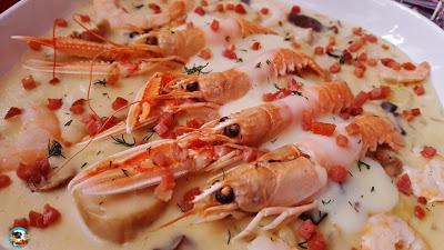 Cigalas con salsa de setas