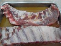 Costillas de cerdo lacadas con miel naranja y brandy