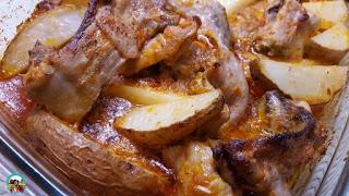 Conejo asado con mojo rojo