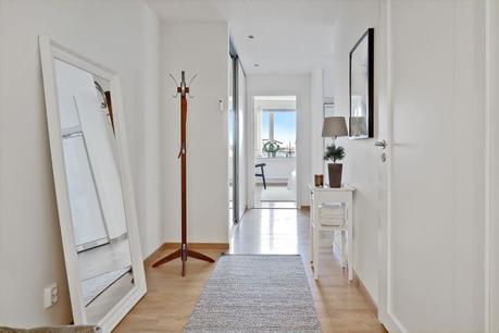 pisos suecos Piso en esquina con terraza madera terrazas diseño interiores pisos pequeños decoración terrazas decoración pisos pequeños blog decoración nórdica alquiler compra pisos intermedios 