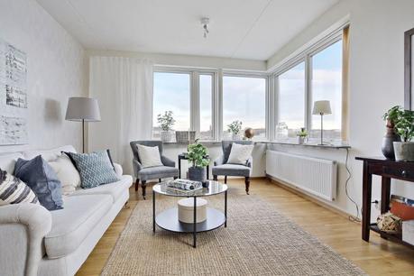 pisos suecos Piso en esquina con terraza madera terrazas diseño interiores pisos pequeños decoración terrazas decoración pisos pequeños blog decoración nórdica alquiler compra pisos intermedios 