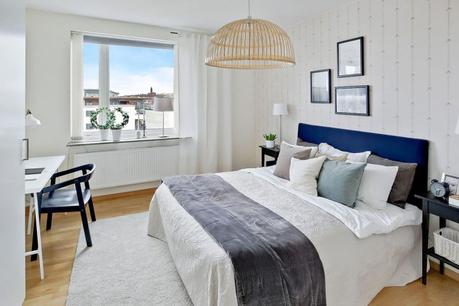 pisos suecos Piso en esquina con terraza madera terrazas diseño interiores pisos pequeños decoración terrazas decoración pisos pequeños blog decoración nórdica alquiler compra pisos intermedios 