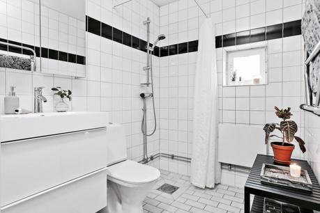 salón buhardilla pared de cristal estilo nórdico distribución diáfana distribución abierta decoración viviendas pequeñas decoración practica y acogedora decoración minipisos decoración en blanco decoración áticos blog interiores 