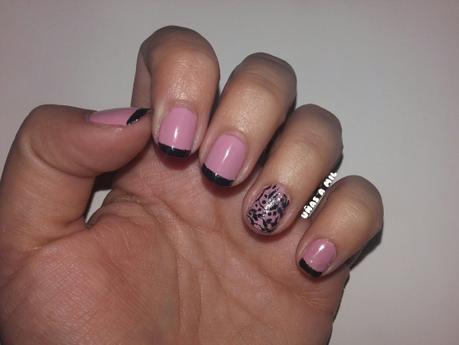 Diseño de uñas en rosa y negro con estampación y manicura francesa
