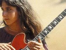 "Firefly" (1981), primer trabajo guitarrista NYC, Emily Reimler.
