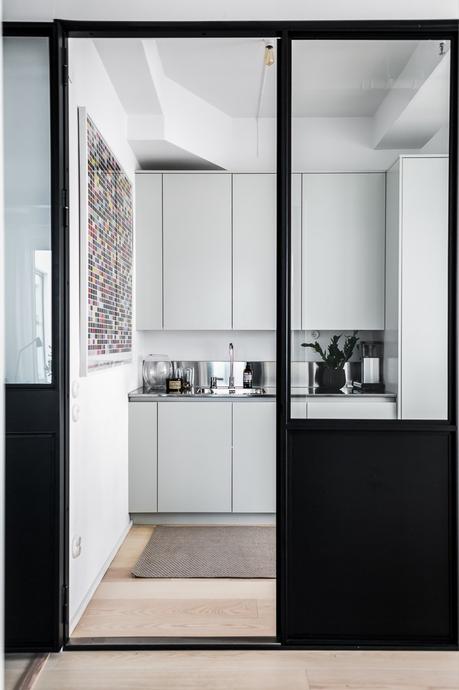 piso en antigua fábrica diseño loft decoración nórdica decoración loft decoración interiores suecos decoración gris madera plantas blog decoración escandinava Apartamento tipo loft con grandes ventanales 