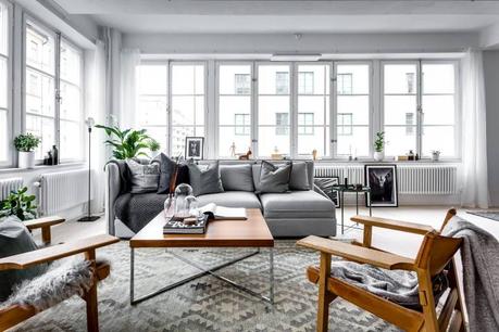 piso en antigua fábrica diseño loft decoración nórdica decoración loft decoración interiores suecos decoración gris madera plantas blog decoración escandinava Apartamento tipo loft con grandes ventanales 