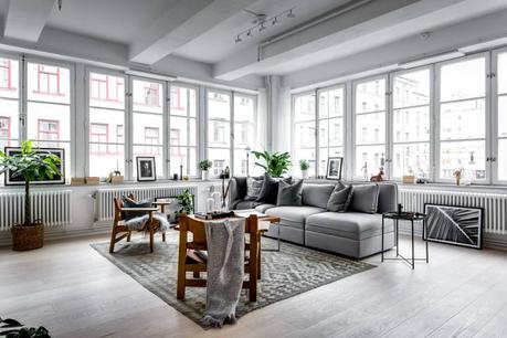 piso en antigua fábrica diseño loft decoración nórdica decoración loft decoración interiores suecos decoración gris madera plantas blog decoración escandinava Apartamento tipo loft con grandes ventanales 