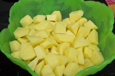 Pollo asado al mojo rojo con patatas