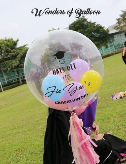 Decora tu graduación con arreglos de Globos