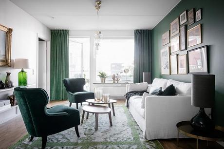 Un apartamento con las paredes verdes