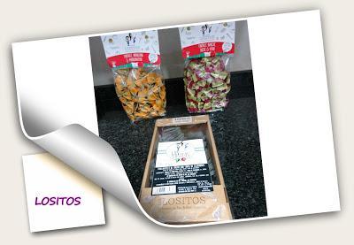 TALLARINES DE HUEVO Y TINTA DE CALAMAR CON SEPIA Y GAMBAS