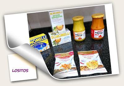 TALLARINES DE HUEVO Y TINTA DE CALAMAR CON SEPIA Y GAMBAS