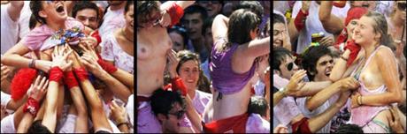 Mujeres ofrecen sus tetas a la viril multitud en San Fermín