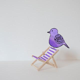 Ocell i Tumbona / Pájaro y hamaca