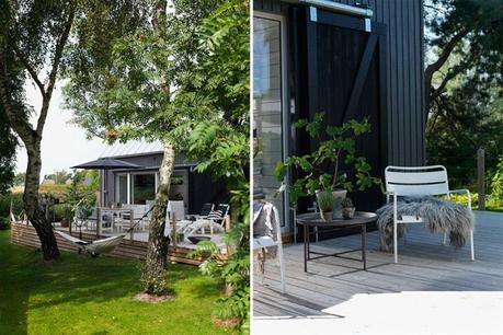 terraza de madera pergola negro exteriores estilo sueco estilo nórdico diseño exteriores decoración exteriores casas negras casa verano suecia bbq 
