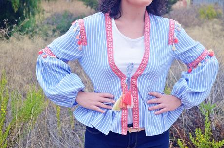 Blusa con pompones