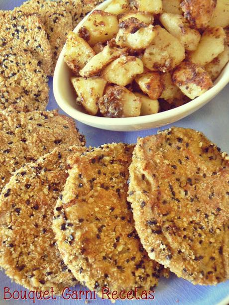 Milanesas de gírgolas con papas asadas al queso Cheddar