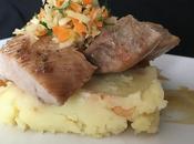 Secreto ibérico naranja miel sobre cama pure frutos secos