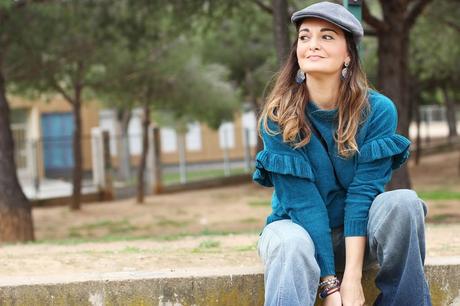 Con pantalones de campana