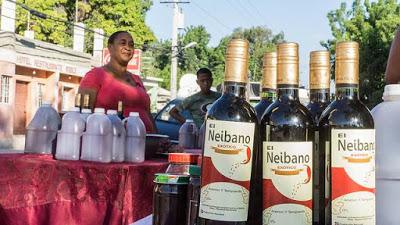 Arnoly, mujer trabajadora de barrio,vendedora de uvas, vinos y mermeladas.