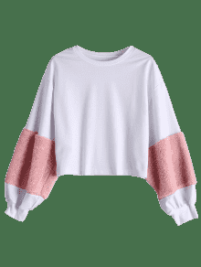 Sudadera con adornos de piel sintética con manga de soplo