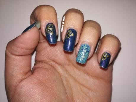 Diseño de uñas para Navidad en azul y dorado Diseño de uñas para Navidad en azul y dorado
